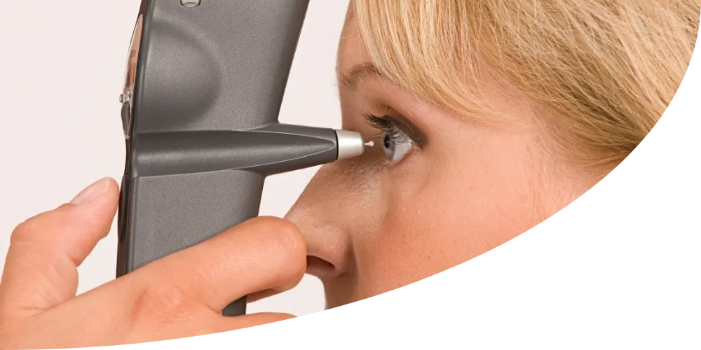 Woman undergoing glaucoma screening with tonometry device at Fox Run Eye Care, highlighting importance of early detection in eye health.